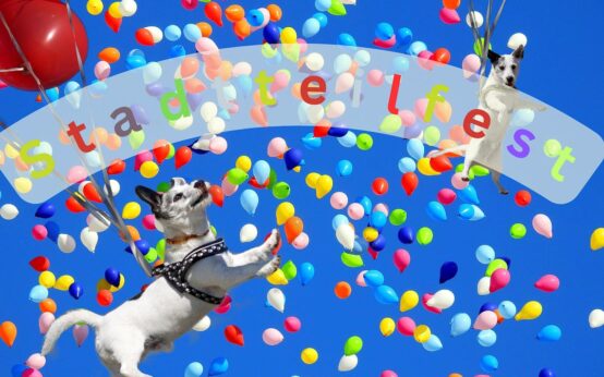 Symbolbild: Stadtteilfest Schelmengraben, Luftballons und fliegende Hunde.