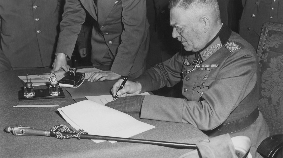 Field Marshall Keitel signs German surrender terms in Berlin 8 May 1945.
