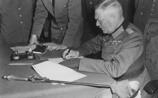 Field Marshall Keitel signs German surrender terms in Berlin 8 May 1945.